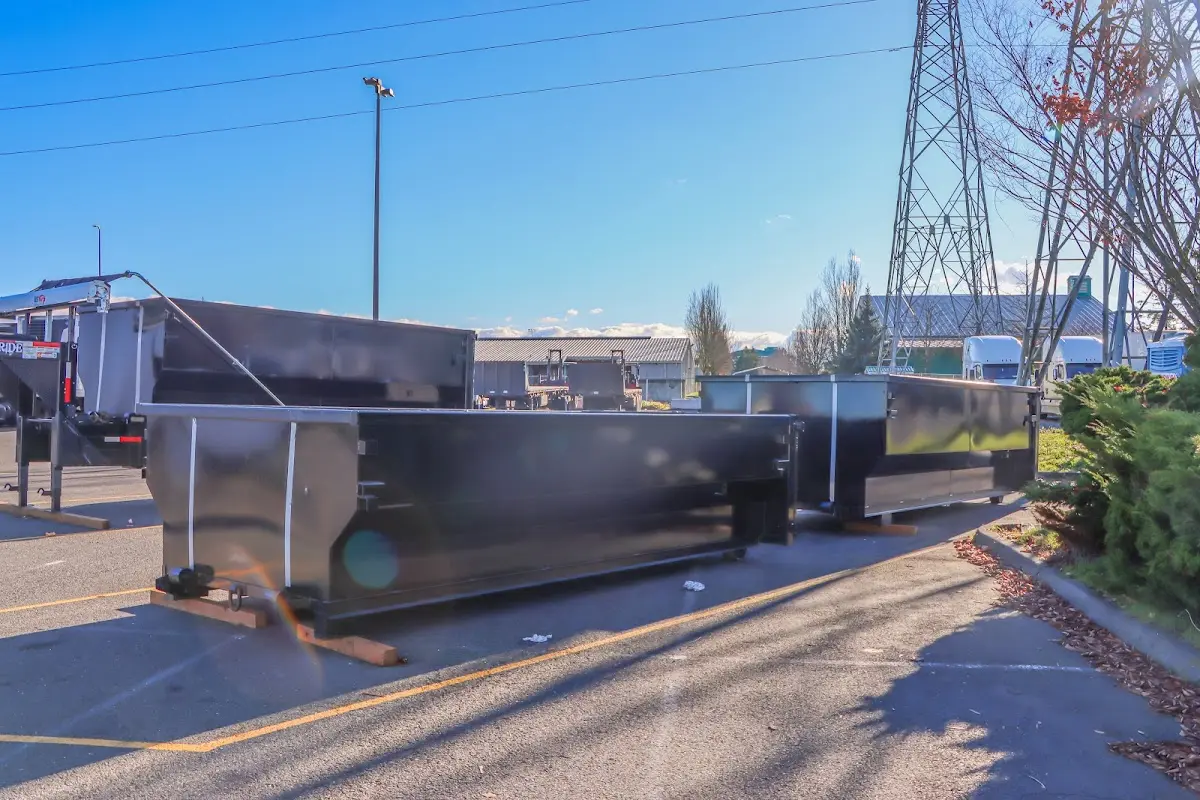 Roll-off dumpster ready for waste disposal at job site for 15 Yard Dumpster Rental in Riverside